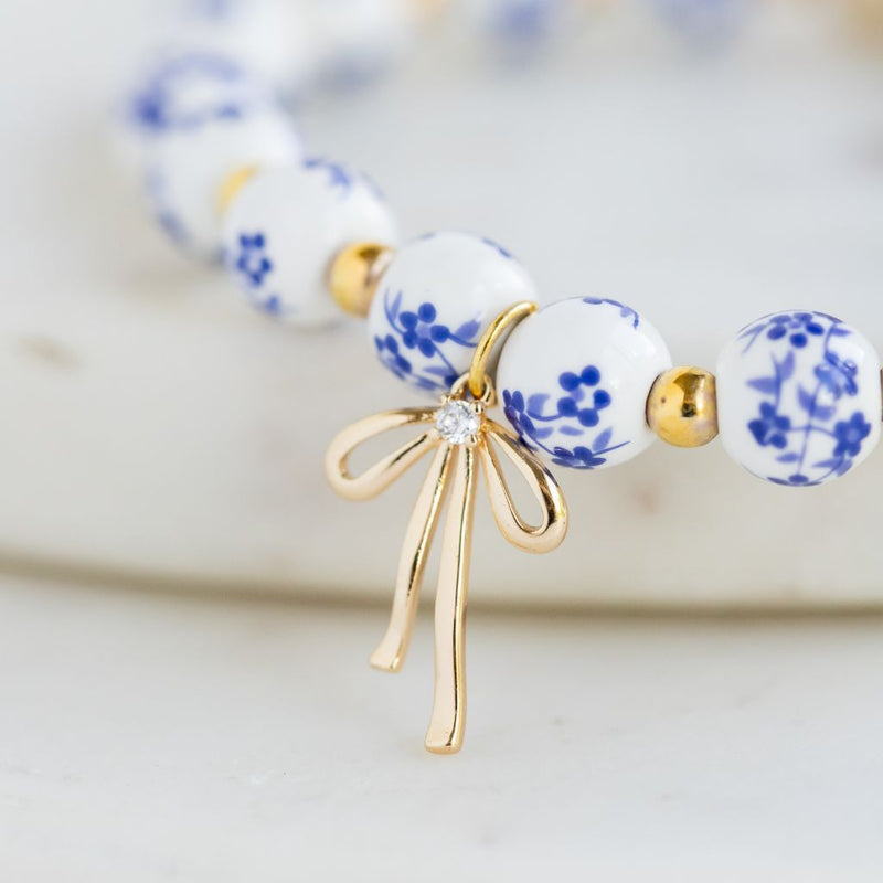 Essential Oil Diffuser Bracelet: Blue Floral Beads w/ Gold Ribbon Charm