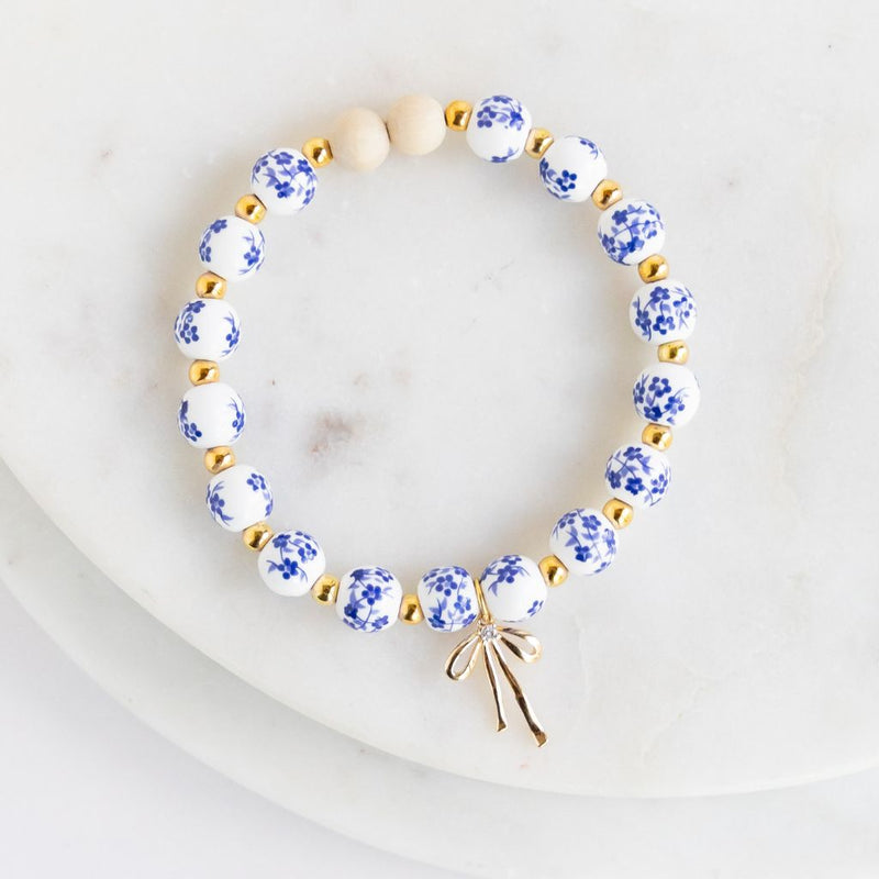Essential Oil Diffuser Bracelet: Blue Floral Beads w/ Gold Ribbon Charm