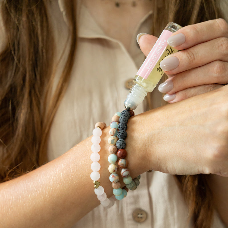 Applying Power of She Blend to bracelets