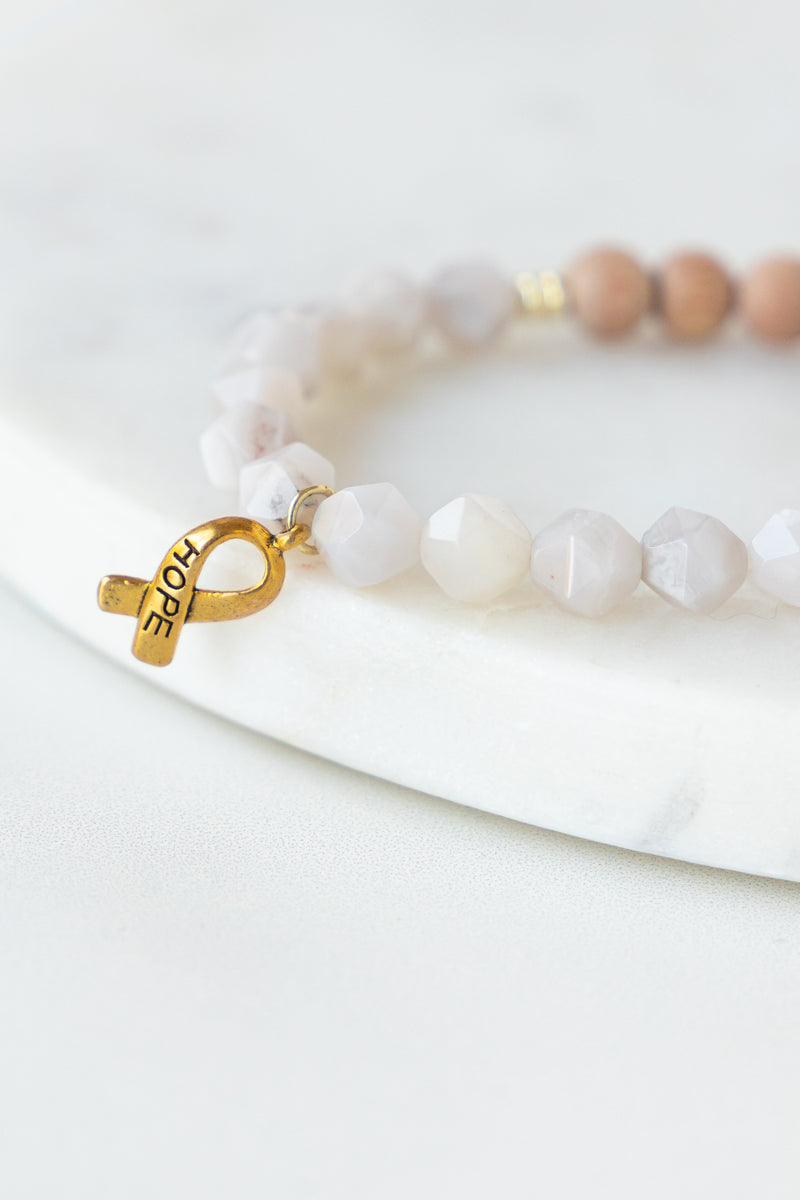 Essential Oil Diffuser Bracelet: Moonstone with Hope Cancer Ribbon Charm